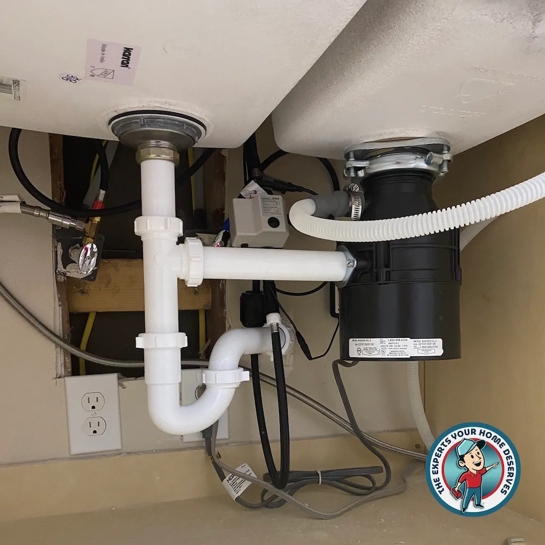 New garbage disposal and new drain kit installed in the kit
