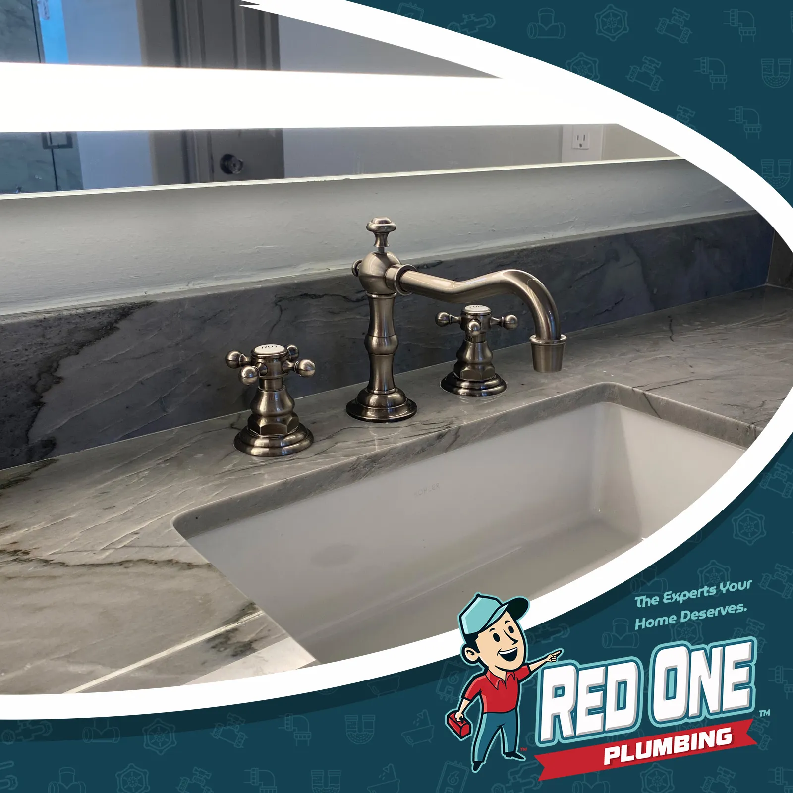 Silver vanity faucet installed by Red One Plumbing